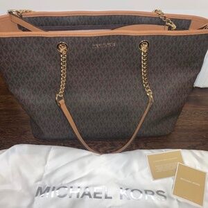 Michael Kors Tote with protective sleeve and cards
